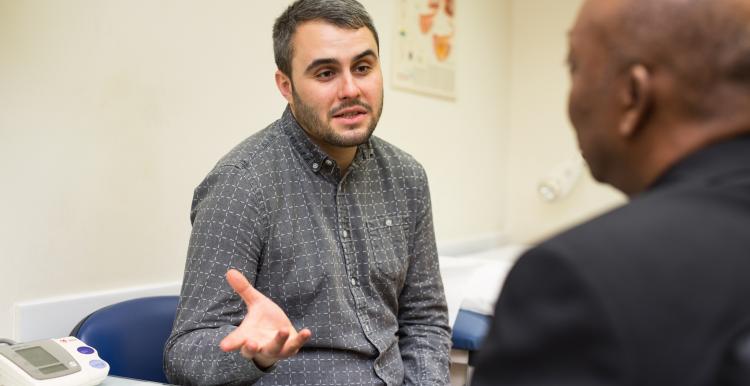 Man talking to his doctor